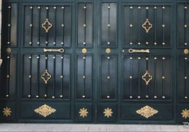 Puerta Doble puerta de bloque en hierro con accesorios y tiradores de cordón en latón