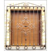 3052 Reja con adornos centrales, círculos inferiores y lanza superior en hierro